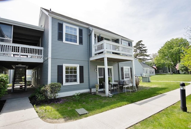 800 Commons Way Unit B, Fishkill, NY 12524 - rear view of property with a yard, stairs, and a balcony