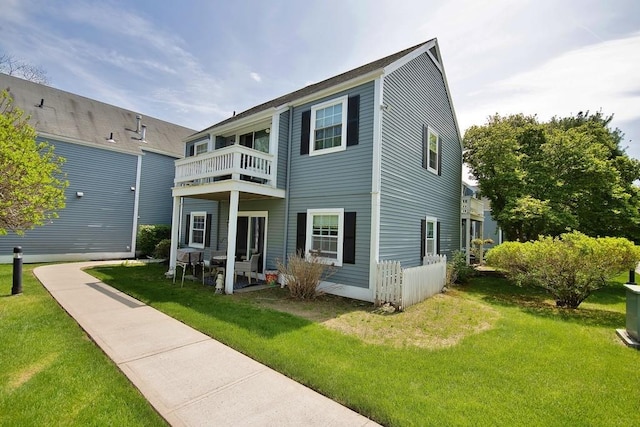 800 Commons Way Unit B, Fishkill, NY 12524 - rear view of property featuring a balcony and a lawn