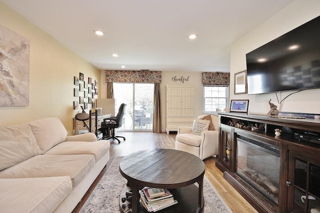 800 Commons Way Unit B, Fishkill, NY 12524 - living area featuring light wood-style floors, a glass covered fireplace, recessed lighting, and an office area