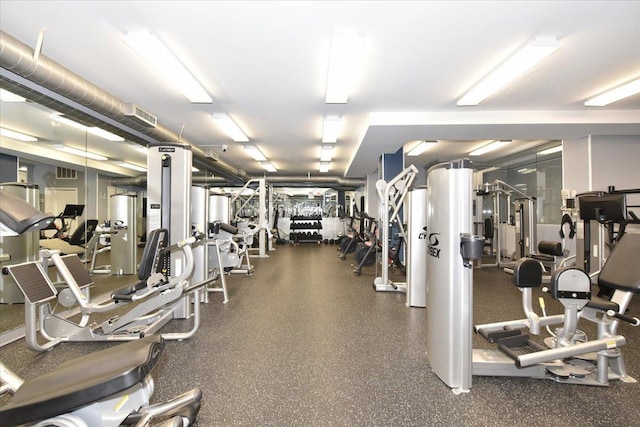 exercise room featuring visible vents
