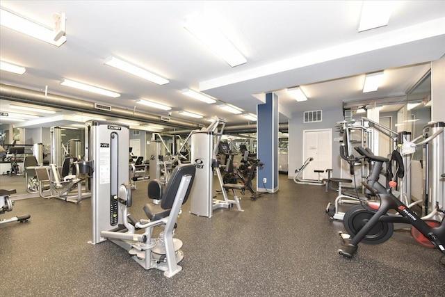 gym featuring visible vents
