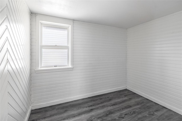 14-11 Cross Bay Blvd, Broad Channel, NY 11693 - empty room featuring baseboards and dark wood-style floors
