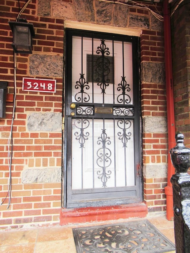 3248 Hone Ave, Bronx, NY 10469 - doorway to property with brick siding