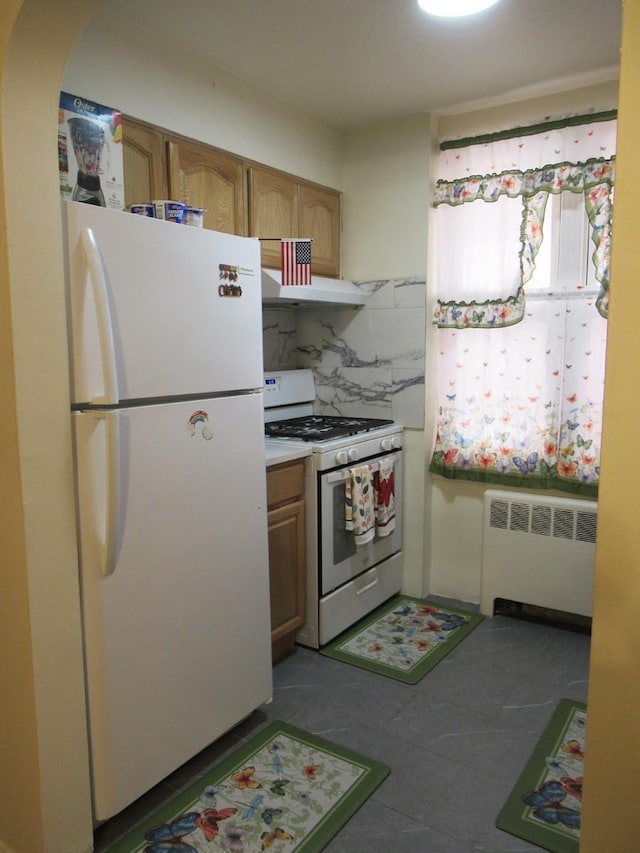 3248 Hone Ave, Bronx, NY 10469 - kitchen with white appliances, radiator heating unit, decorative backsplash, arched walkways, and light countertops