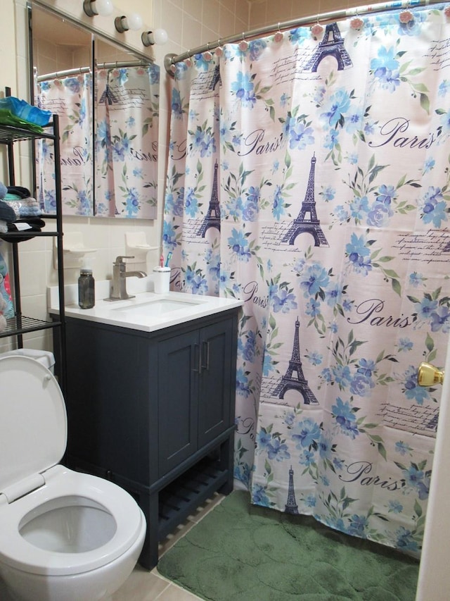3248 Hone Ave, Bronx, NY 10469 - bathroom with toilet, tile walls, vanity, and a shower with shower curtain