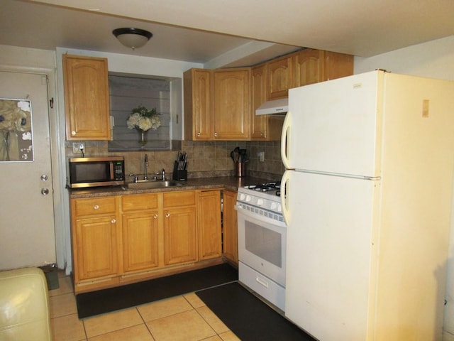 3248 Hone Ave, Bronx, NY 10469 - kitchen featuring a sink, white appliances, under cabinet range hood, decorative backsplash, and light tile patterned floors