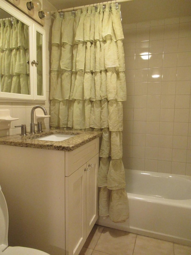 3248 Hone Ave, Bronx, NY 10469 - bathroom featuring toilet, tile patterned floors, vanity, and shower / bath combo with shower curtain