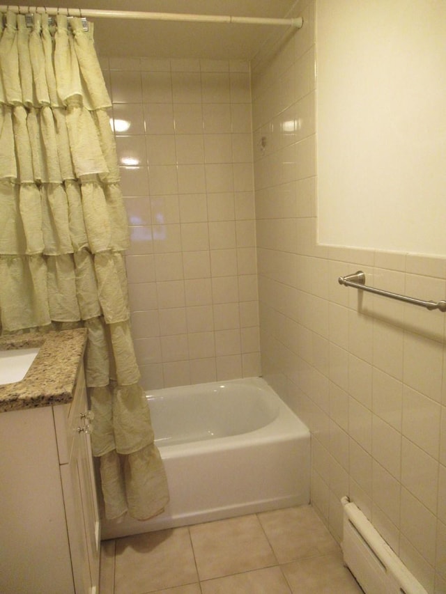 3248 Hone Ave, Bronx, NY 10469 - bathroom featuring tile walls, tile patterned floors, vanity, and shower / bath combination with curtain