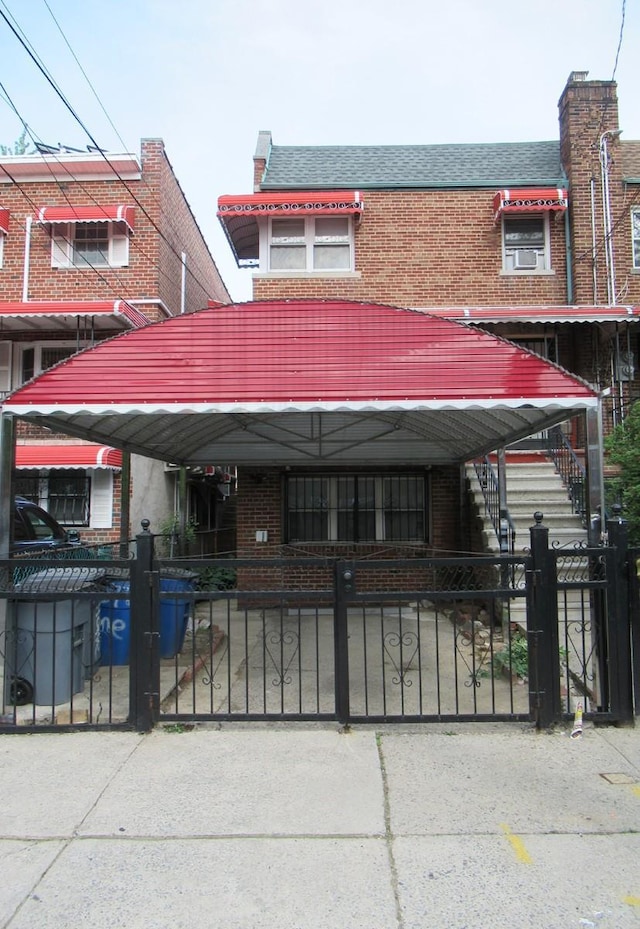 3248 Hone Ave, Bronx, NY 10469 - multi unit property featuring a fenced front yard and brick siding