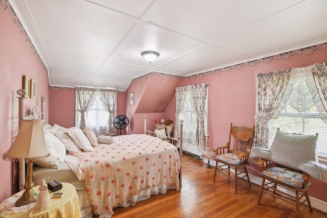bedroom featuring hardwood / wood-style flooring