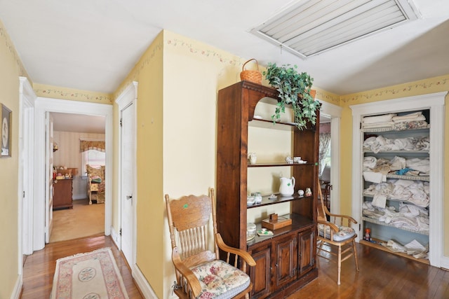 hallway featuring hardwood / wood-style floors