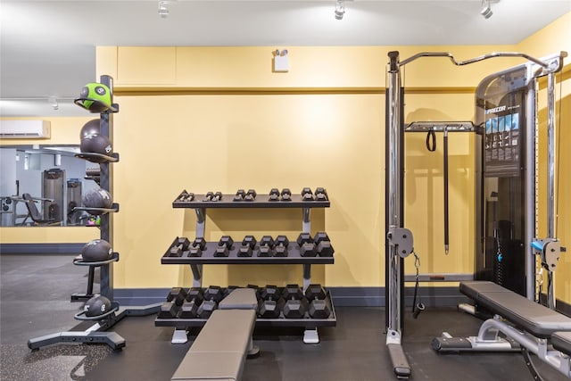 workout area with a wall unit AC