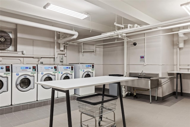 common laundry area featuring tile patterned floors and independent washer and dryer