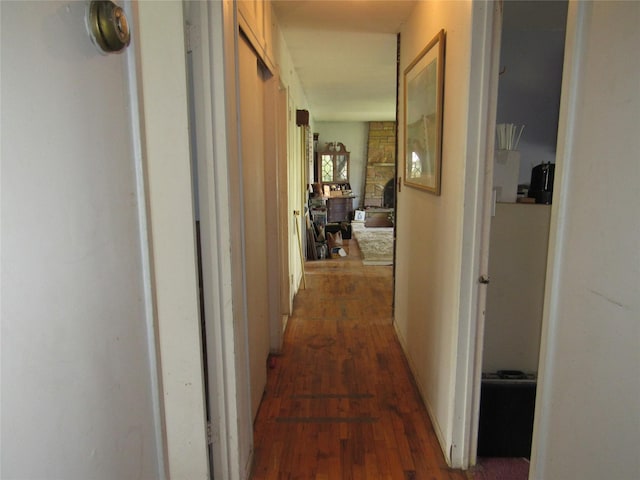 corridor with dark wood-type flooring