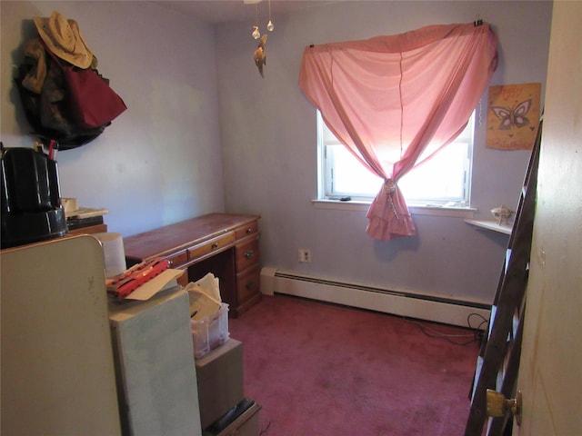 interior space with a baseboard heating unit and carpet flooring