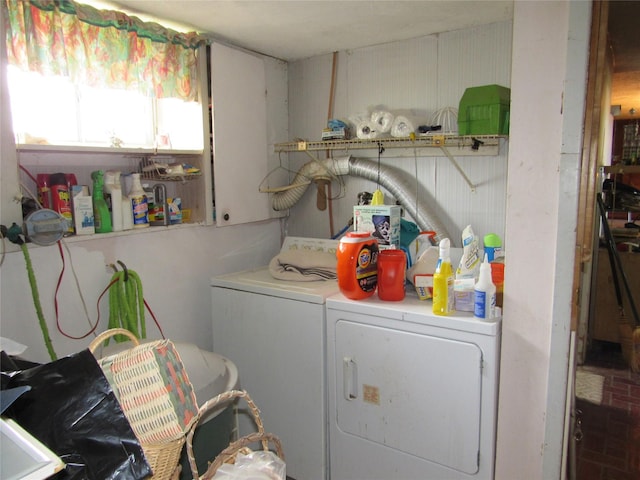 washroom with laundry area and washer and dryer