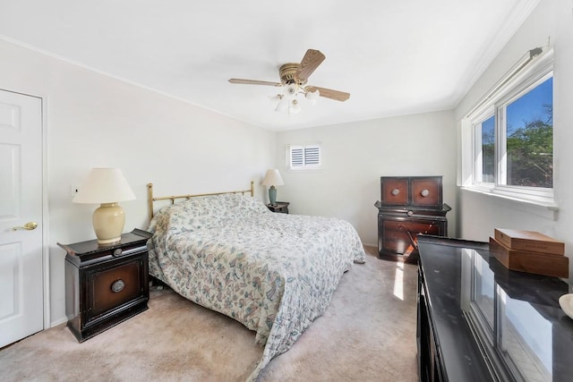 carpeted bedroom with baseboards, a ceiling fan, and multiple windows