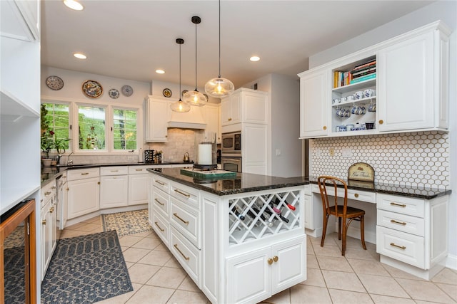 kitchen featuring stainless steel appliances, light tile patterned floors, beverage cooler, tasteful backsplash, and a center island