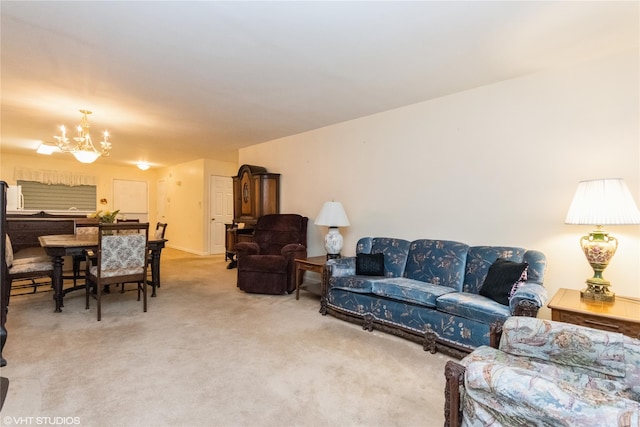 living room with an inviting chandelier and carpet