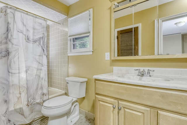 full bath with toilet, shower / tub combo with curtain, vanity, tile patterned floors, and baseboards