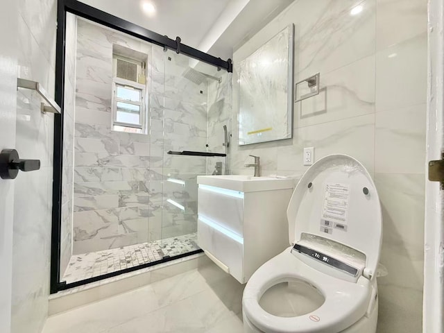 full bath with vanity, toilet, marble finish floor, tile walls, and a shower stall