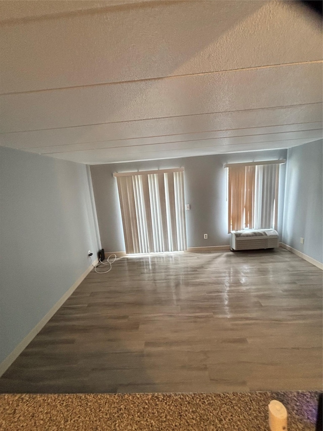 108-08 Flatlands 9th St Unit 14A, Brooklyn, NY 11236 - spare room featuring wood finished floors and baseboards