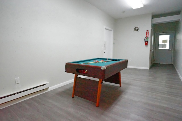 rec room featuring baseboard heating, baseboards, billiards, and wood finished floors