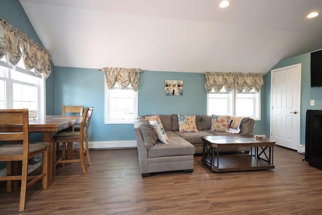 living room with recessed lighting, vaulted ceiling, and wood finished floors