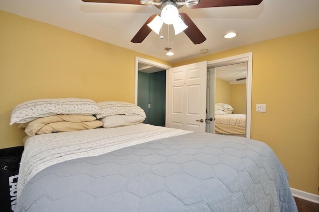 bedroom with recessed lighting, a ceiling fan, baseboards, and wood finished floors