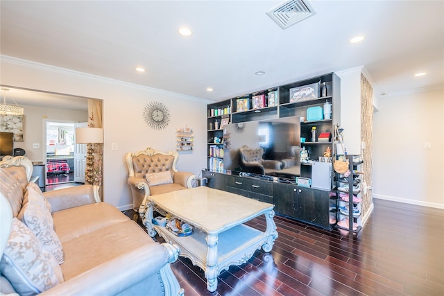 living area featuring visible vents, crown molding, wood finished floors, baseboards, and recessed lighting