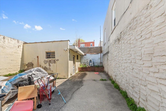 view of side of property featuring a patio