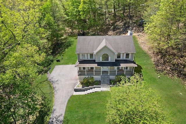 aerial view featuring a forest view