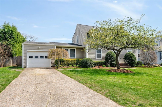 view of front facade with a garage, stairs, driveway, and a front lawn