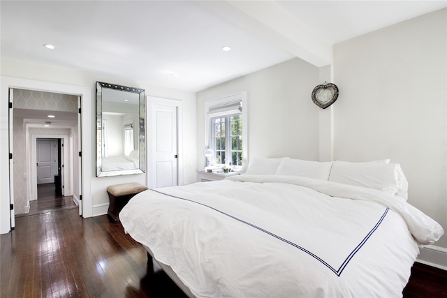 bedroom featuring hardwood / wood-style flooring, baseboards, and recessed lighting