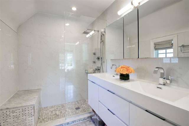 full bathroom with walk in shower, double vanity, backsplash, and recessed lighting