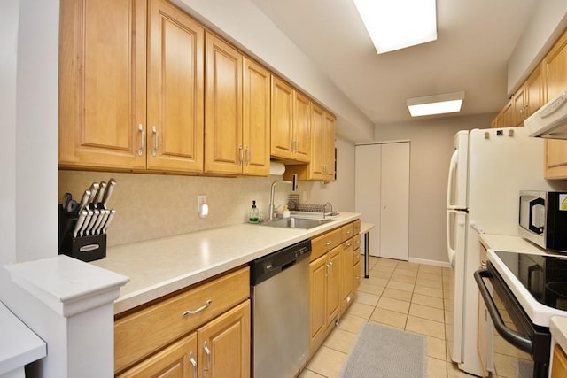 612 Kemeys Cv Unit 12, Briarcliff Manor, NY 10510 - kitchen with electric range, stainless steel dishwasher, a sink, light countertops, and light tile patterned flooring