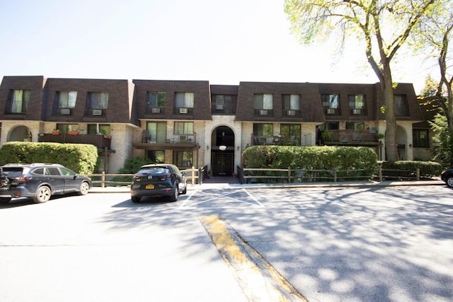 612 Kemeys Cv Unit 12, Briarcliff Manor, NY 10510 - view of building exterior with uncovered parking