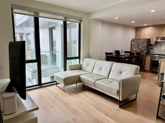 14-33 31st Ave Unit 4H, Astoria, NY 11106 - living room featuring recessed lighting and light wood finished floors