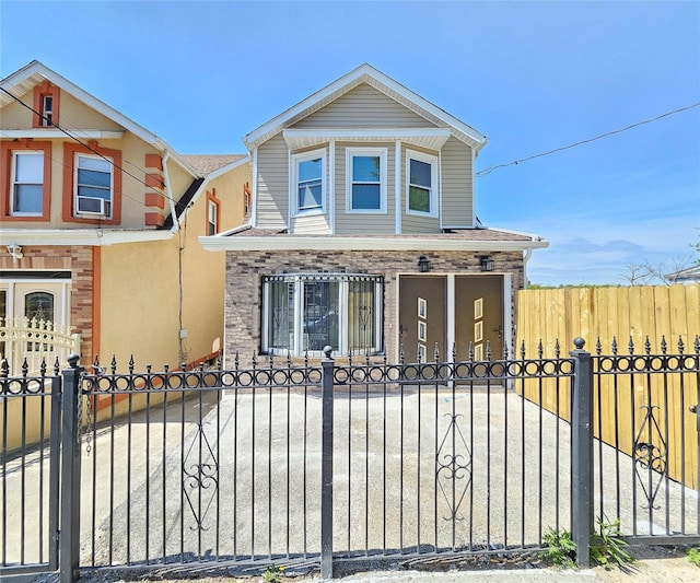 view of front of property with a fenced front yard