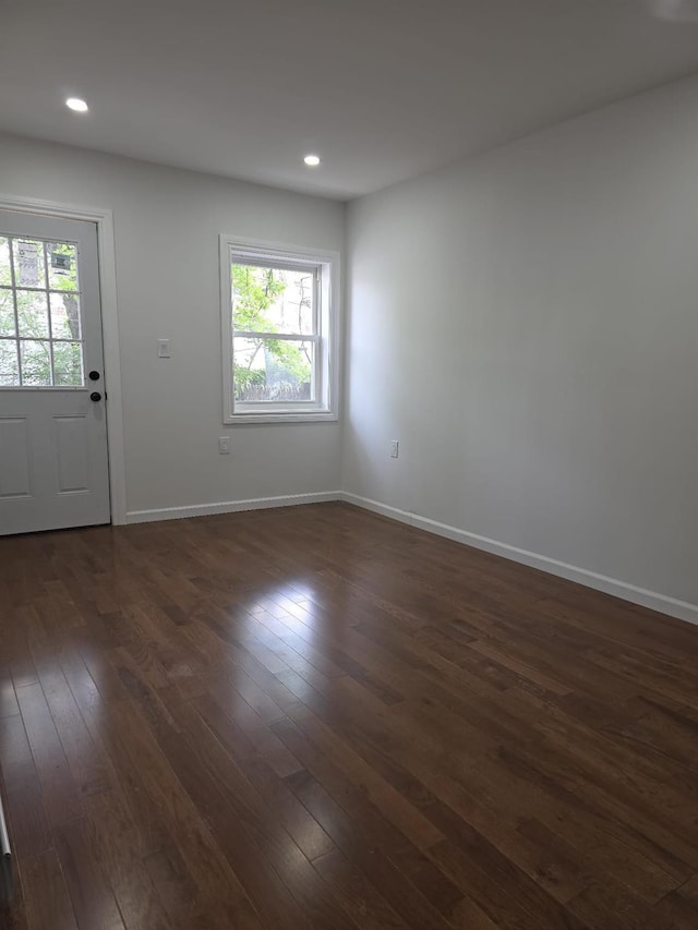 217 E 86th St, Brooklyn, NY 11236 - entrance foyer featuring plenty of natural light, dark wood finished floors, baseboards, and recessed lighting