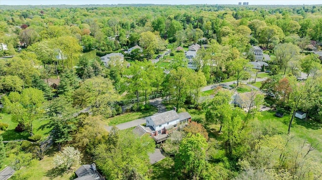 aerial view featuring a view of trees