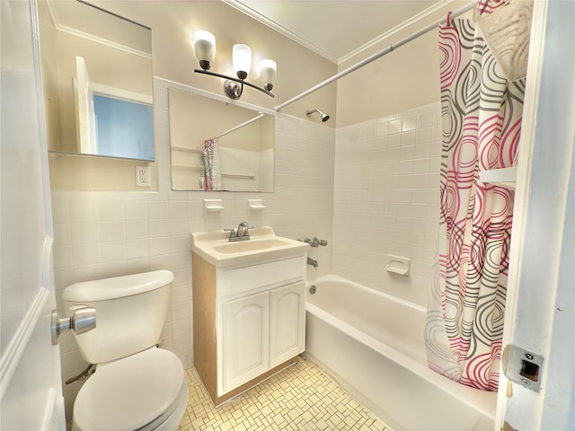 full bath featuring vanity, ornamental molding, toilet, tile walls, and shower / bath combo