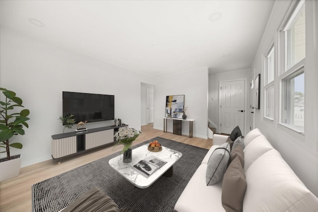 living room with wood finished floors