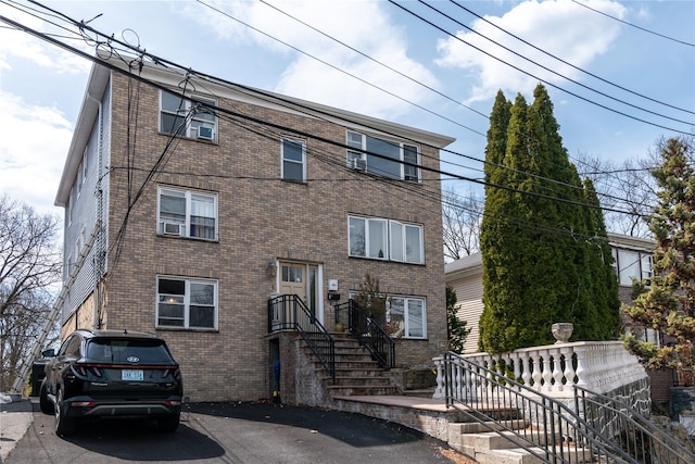 8 Elicar Ter, Yonkers, NY 10701 - view of property with cooling unit and brick siding