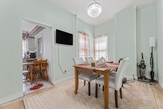 515 S 9th Ave, Mount Vernon, NY 10550 - dining area featuring an inviting chandelier and baseboards