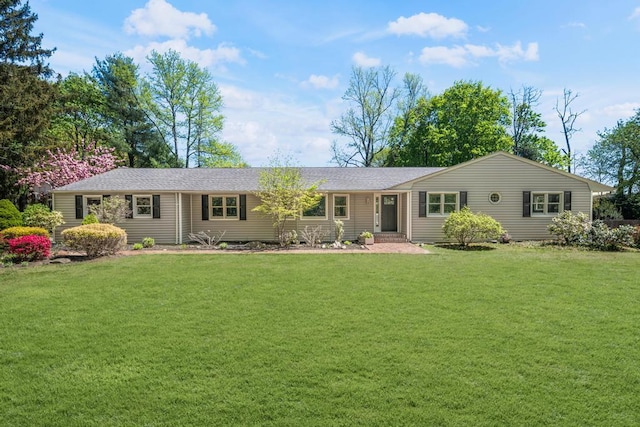 ranch-style house with a front yard
