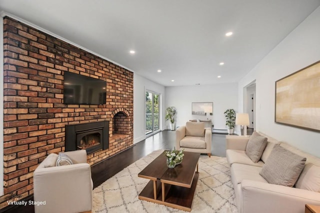 85 Meadow Glen Rd, Fort Salonga, NY 11768 - living area featuring recessed lighting, wood finished floors, and a fireplace