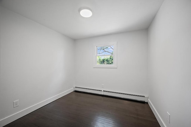 85 Meadow Glen Rd, Fort Salonga, NY 11768 - empty room featuring baseboards, a baseboard radiator, and wood finished floors