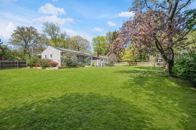 view of yard featuring a fenced backyard