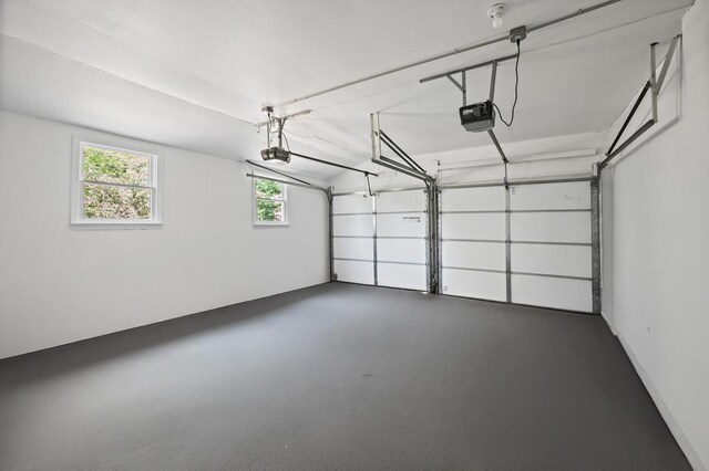 85 Meadow Glen Rd, Fort Salonga, NY 11768 - garage with a garage door opener